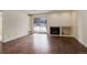 Living room features wood floors, fireplace and sliding glass doors at 2575 S Syracuse Way # 108, Denver, CO 80231