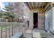 Private patio with storage unit and exterior access at 2575 S Syracuse Way # 108, Denver, CO 80231
