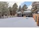 Community pool area covered in snow during winter at 2575 S Syracuse Way # 108, Denver, CO 80231
