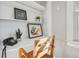 Compact desk area with shelves and a chair at 4326 Batavia Pl, Denver, CO 80220