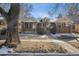 Charming brick home with a well-manicured front yard and inviting curb appeal at 4326 Batavia Pl, Denver, CO 80220