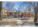 Charming brick home with covered porches and mature trees at 4326 Batavia Pl, Denver, CO 80220