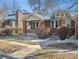 Charming brick home featuring a well-maintained front yard and inviting walkway at 4326 Batavia Pl, Denver, CO 80220