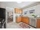 Bright kitchen featuring granite countertops, stainless steel appliances, and ample storage at 4326 Batavia Pl, Denver, CO 80220