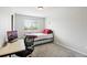 Neutral bedroom with desk, carpet, and natural light at 1440 E 128Th Ct, Thornton, CO 80241
