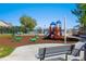 Community playground features slides, climbing structures, and swings for children to enjoy at 1440 E 128Th Ct, Thornton, CO 80241