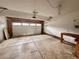 Spacious two car garage with an automatic overhead door and pegboard wall at 10064 Westside Cir, Littleton, CO 80125