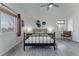 Stylish bedroom with a vaulted ceiling, ceiling fan, and modern decor at 2875 S Tower Way, Aurora, CO 80013