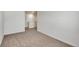 Simple bedroom with neutral walls and carpet at 13547 Valentia St, Thornton, CO 80602