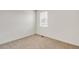 Bright bedroom with neutral walls and carpeted floor at 13547 Valentia St, Thornton, CO 80602