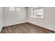 Bright office with hardwood floors and window at 13547 Valentia St, Thornton, CO 80602