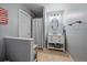 Cozy bathroom with a shower, a floating vanity, and bright paint at 21166 E Euclid Dr, Centennial, CO 80016