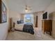 Cozy bedroom featuring a ceiling fan, neutral walls, and natural light at 21166 E Euclid Dr, Centennial, CO 80016