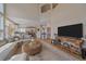 Open-concept design showcasing seamless flow from living room to kitchen, perfect for modern living at 21166 E Euclid Dr, Centennial, CO 80016