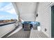 Inviting covered balcony with stylish outdoor seating and views at 3050 Wilson Ct # 1, Denver, CO 80205