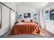 Bright bedroom featuring vaulted ceilings, stylish decor, and large windows for ample natural light at 3050 Wilson Ct # 1, Denver, CO 80205