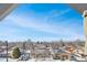 Panoramic neighborhood view showing rooftops, snow-covered ground, and distant mountain scenery at 3050 Wilson Ct # 1, Denver, CO 80205