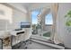 Bright office space with a modern desk setup and walk-out access to a personal deck at 3050 Wilson Ct # 1, Denver, CO 80205