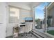 Bright office space with a modern desk setup and walk-out access to a personal deck at 3050 Wilson Ct # 1, Denver, CO 80205