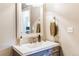 Bathroom sink with granite countertop and modern fixtures at 7256 Aspen Meadow Dr, Evergreen, CO 80439
