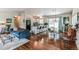 Open concept living and kitchen area featuring hardwood floors at 7256 Aspen Meadow Dr, Evergreen, CO 80439