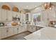 Kitchen featuring stainless steel appliances, light gray cabinets and a kitchen window with neighborhood views at 6471 S Potomac Ct, Englewood, CO 80111