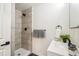 Updated bathroom featuring tiled shower, modern vanity and black fixtures at 2230 Niagara St, Denver, CO 80207