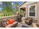 Inviting patio area with comfortable seating and a gas grill, perfect for outdoor dining at 570 Clarendon Loop, Castle Pines, CO 80108