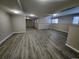 Finished basement with vinyl flooring, great for recreation at 18874 E Ida Ave, Aurora, CO 80015