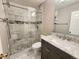 Updated bathroom with marble vanity and shower at 18874 E Ida Ave, Aurora, CO 80015