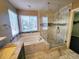 Bathroom boasts a large shower and soaking tub at 18874 E Ida Ave, Aurora, CO 80015