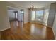 Formal dining room featuring hardwood floors and bay window at 18874 E Ida Ave, Aurora, CO 80015