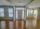 Bright entryway with hardwood floors and neutral color palette at 18874 E Ida Ave, Aurora, CO 80015