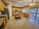 Kitchen with granite countertops, stainless steel appliances, and an island at 18874 E Ida Ave, Aurora, CO 80015