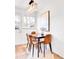 Bright dining area with modern light fixture, stylish seating, and simple decor for everyday meals at 4201 Shoshone St, Denver, CO 80211