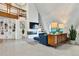 Bright living area with sleek fireplace, modern shelving, and contemporary decor at 6681 S Abilene Way, Centennial, CO 80111