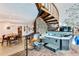 Entertainment area featuring a hot tub and an open concept dining area at 6681 S Abilene Way, Centennial, CO 80111