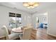 Dining room with pendant lighting, with an adjacent study room at 2170 W Warren Ave, Englewood, CO 80110