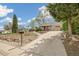 Exterior view of a house with a well-maintained lawn and driveway, showcasing its curb appeal at 2170 W Warren Ave, Englewood, CO 80110