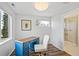 Office space leading to a remodeled bathroom with intricate patterns at 2170 W Warren Ave, Englewood, CO 80110