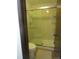Bathroom features a shower with sliding glass doors and a toilet at 11710 Elk Head Range Rd, Littleton, CO 80127