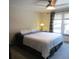 Bright bedroom with large windows and a ceiling fan at 11710 Elk Head Range Rd, Littleton, CO 80127