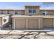 Exterior shot of attached garage with two doors and ample parking space in driveway at 11710 Elk Head Range Rd, Littleton, CO 80127