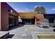 Backyard patio with a hot tub, outdoor ceiling and steel accents at 8900 W Hampden Ave, Denver, CO 80227