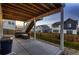 Backyard patio area offering an outdoor seating area with privacy fencing at 17203 Birds Foot Ave, Parker, CO 80134