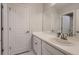 Bathroom featuring a sink with vanity, mirror, and modern fixtures at 17203 Birds Foot Ave, Parker, CO 80134