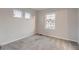 Bright bedroom with ample natural light and neutral carpet at 17203 Birds Foot Ave, Parker, CO 80134