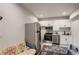 Kitchen featuring modern appliances, ample cabinet space, and stainless steel refrigerator at 17203 Birds Foot Ave, Parker, CO 80134
