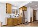 Kitchen featuring stainless steel appliances, granite countertops, and ample natural light at 1324 Shadow Mountain Dr, Highlands Ranch, CO 80126