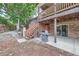 Backyard with stairs leading to deck and patio at 11275 Ranch Pl, Denver, CO 80234